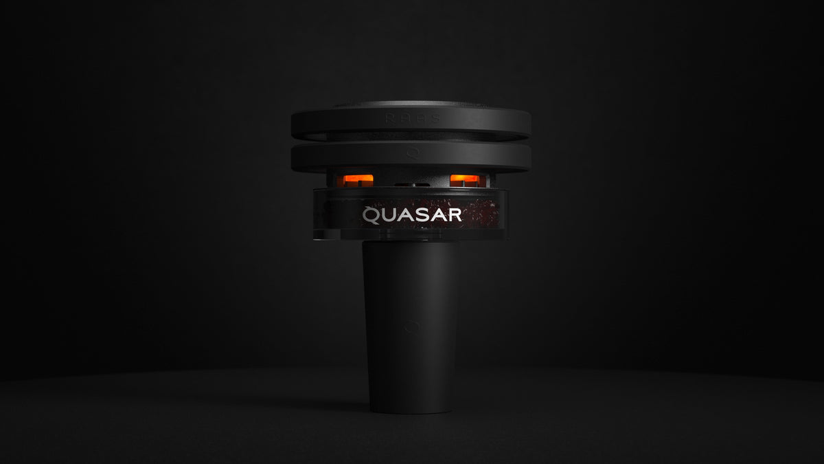 Quasar Raas 2 Hookah Heating System glowing with coals, showcasing its power in a dark setting
, image 12 of 17
