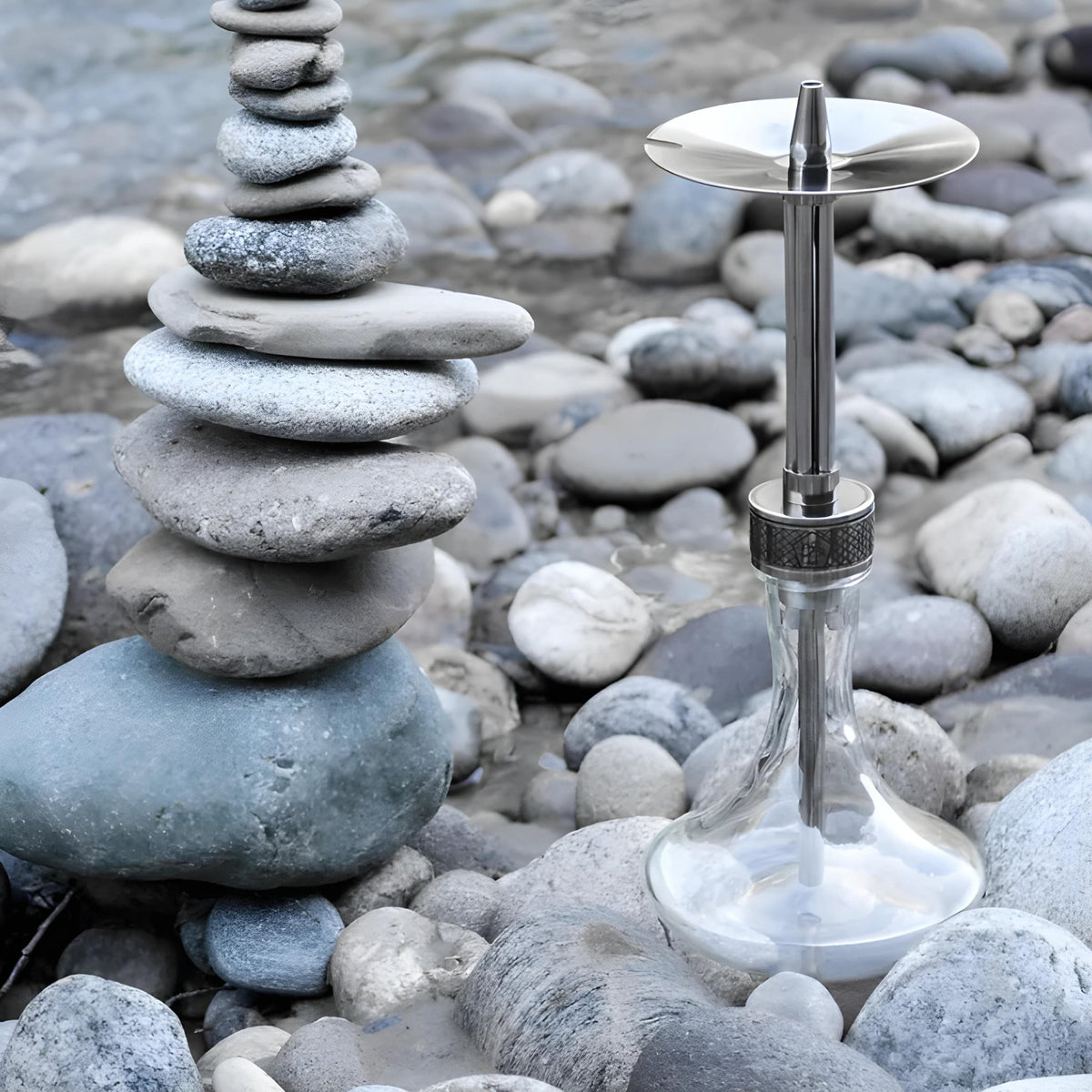 BS Hookah REF shisha pipe placed on rocks outdoors with clear glass vase
, image 3 of 7