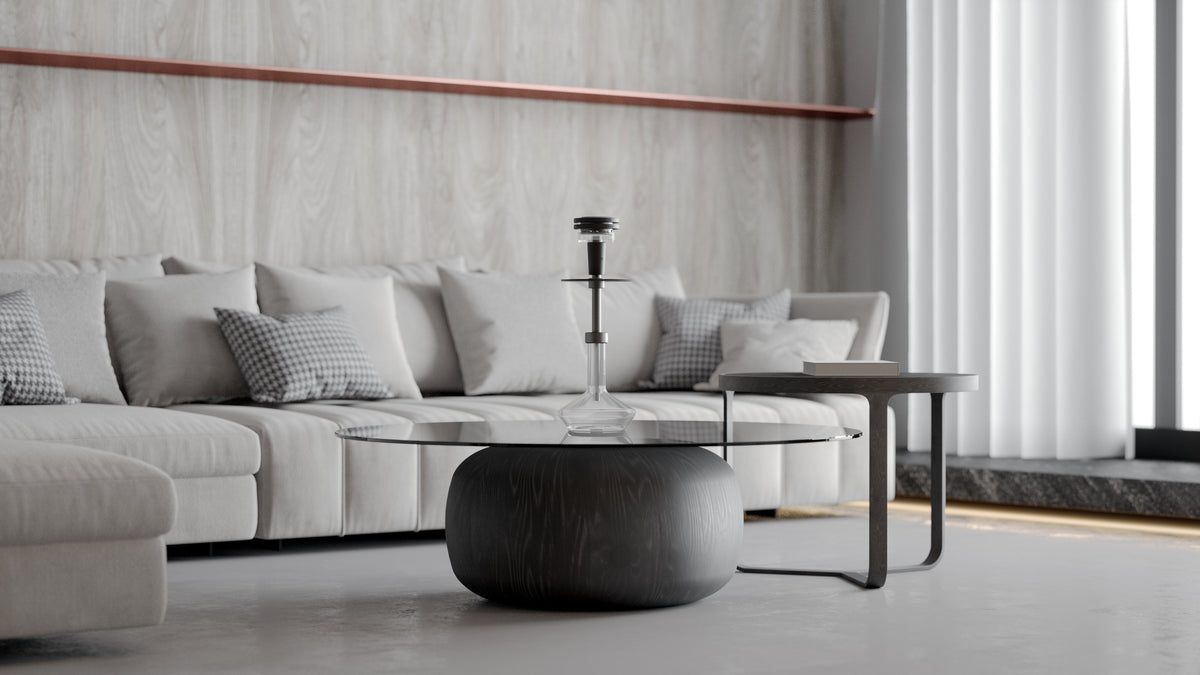 Quasar Raas 2 elegantly displayed on a modern glass coffee table in a living room setting
, image 16 of 17