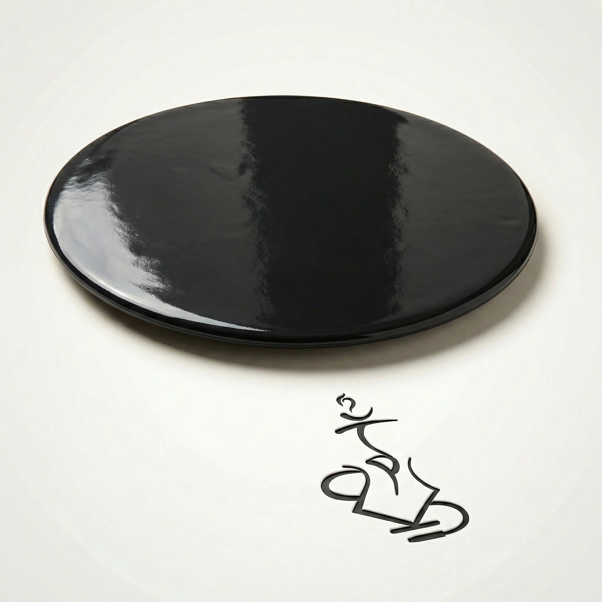 Underside of the 320° Hookah Base Mat showing the smooth non-slip silicone grip face that holds firm on wood, glass, stone, and tile surfaces.