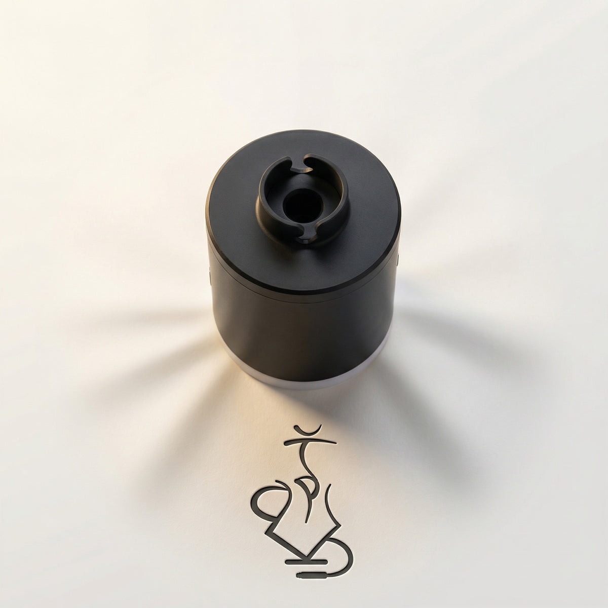 Top-down view of the 320° LED electric coal starter pump showing the two-prong silicone hose cradle and suction port on the top face of the pump., image 7 of 12