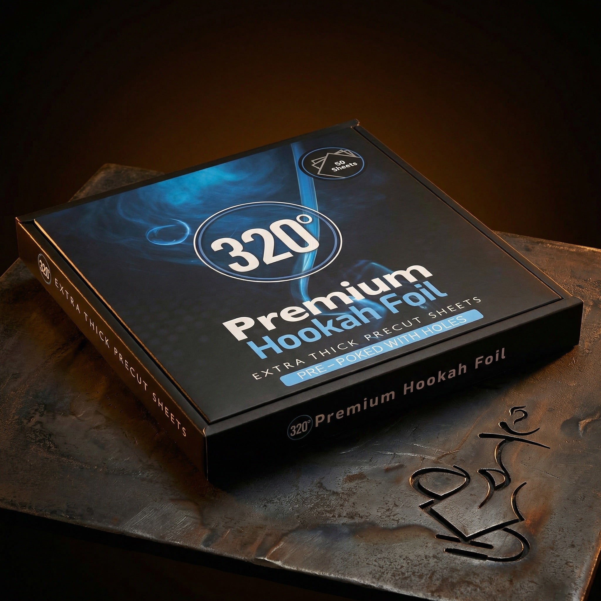 320° Premium Hookah Foil box lit dramatically on a dark forged steel surface, showing the extra thick precut pre-poked shisha foil sheets packaging in warm editorial light.
