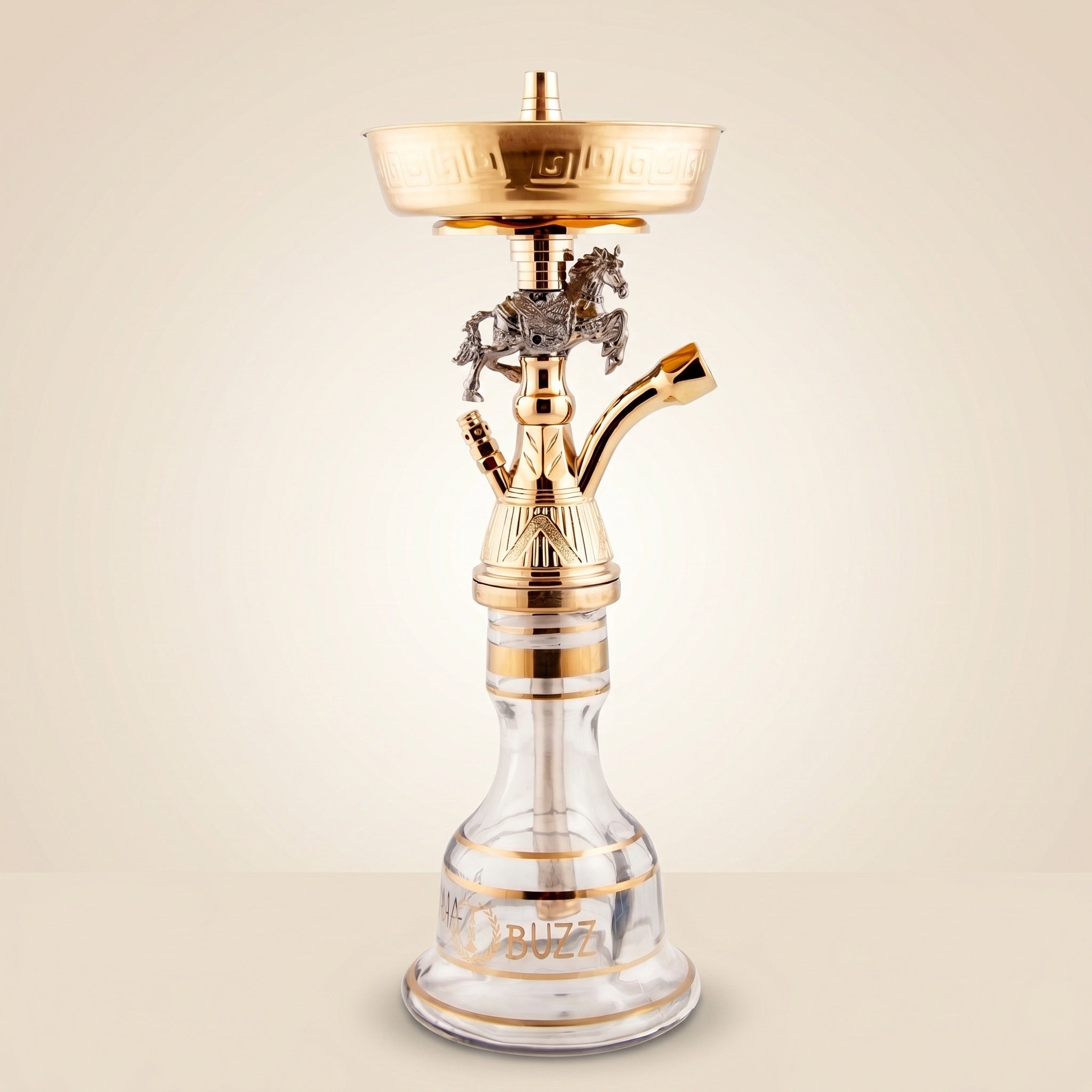 Basha Buzz Mustang shisha pipe with silver rearing stallion and gold stem on warm cream studio background