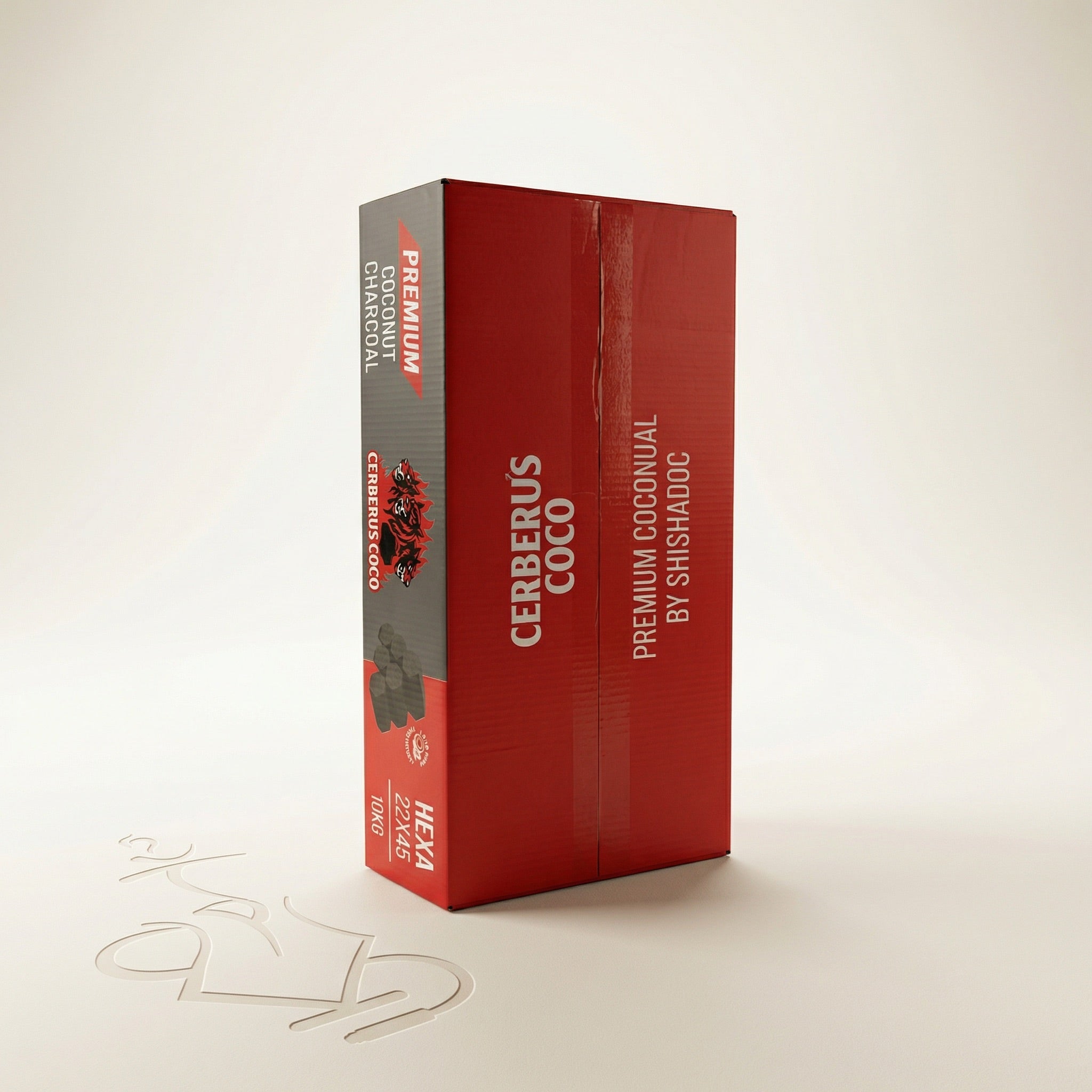 Cerberus Coco Hexa 22×45mm 10kg retail carton standing upright showing front and side panel branding on a warm white studio background