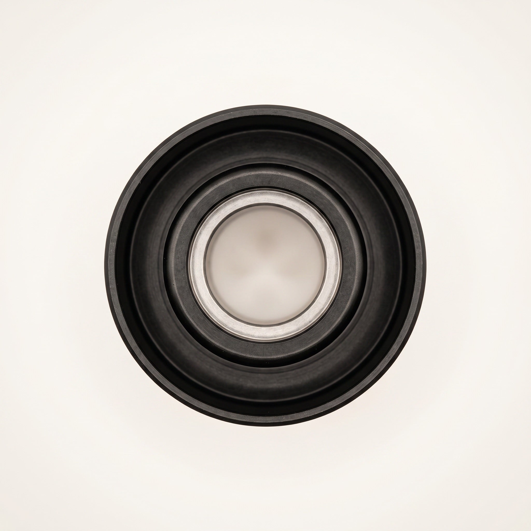 Darkside D-Catcher top view showing concentric machined aluminium rings and central port, The Premium Way