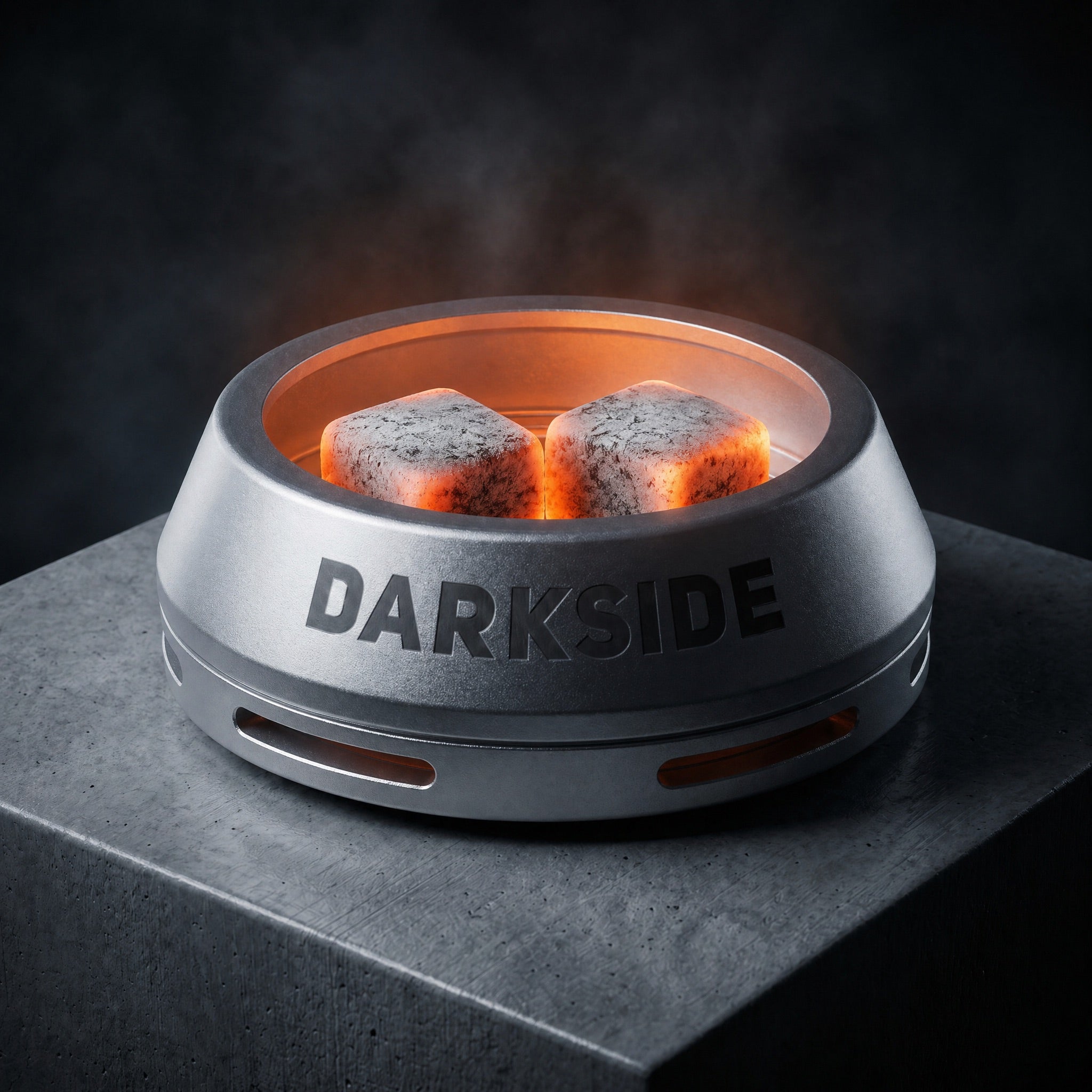 Darkside D-Heater Silver with three lit coconut coal cubes glowing inside the open chamber