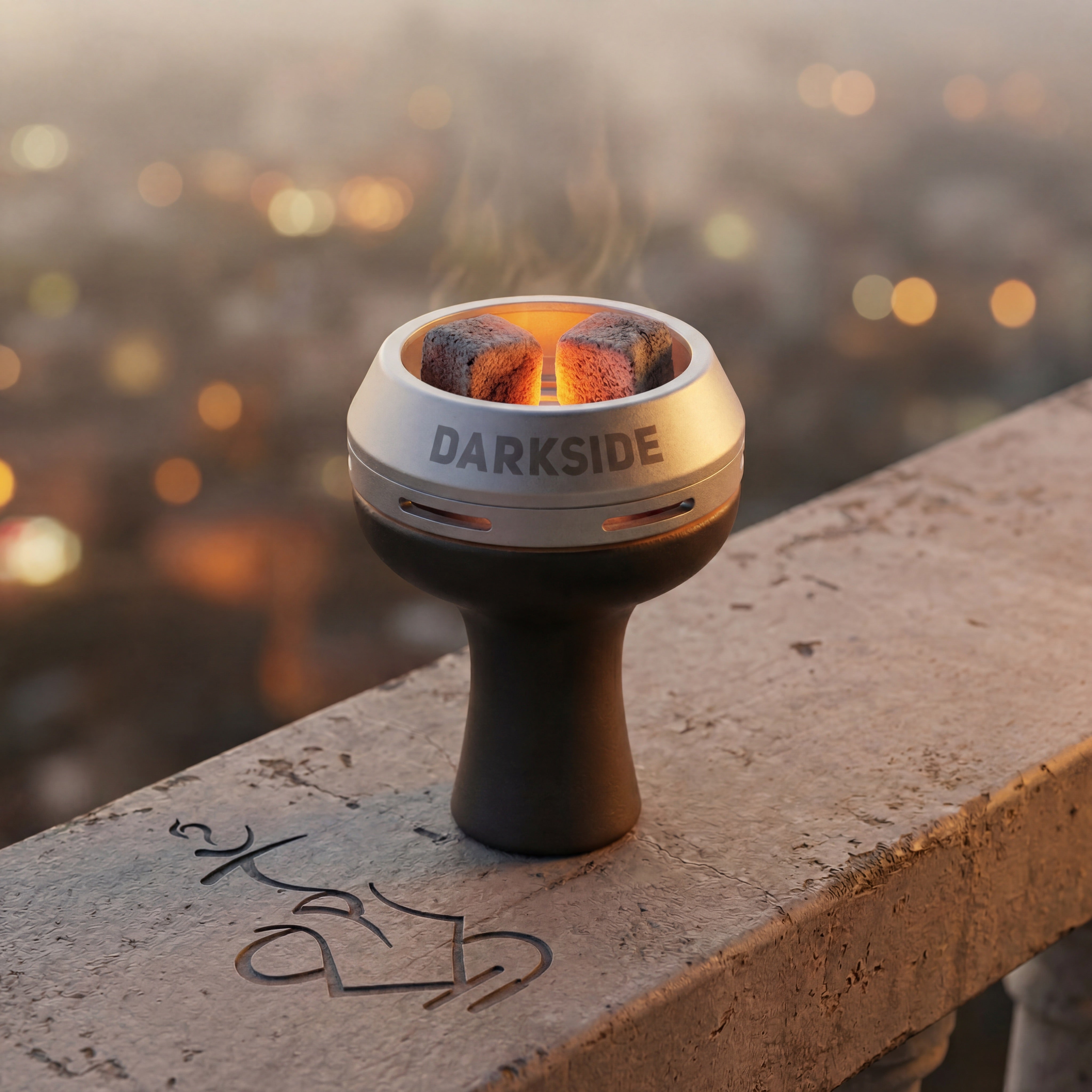 Darkside D-Heater Silver HMD loaded with glowing coconut coals on a phunnel bowl at a dusk balcony session, buy online from Melbourne's premium shisha store.