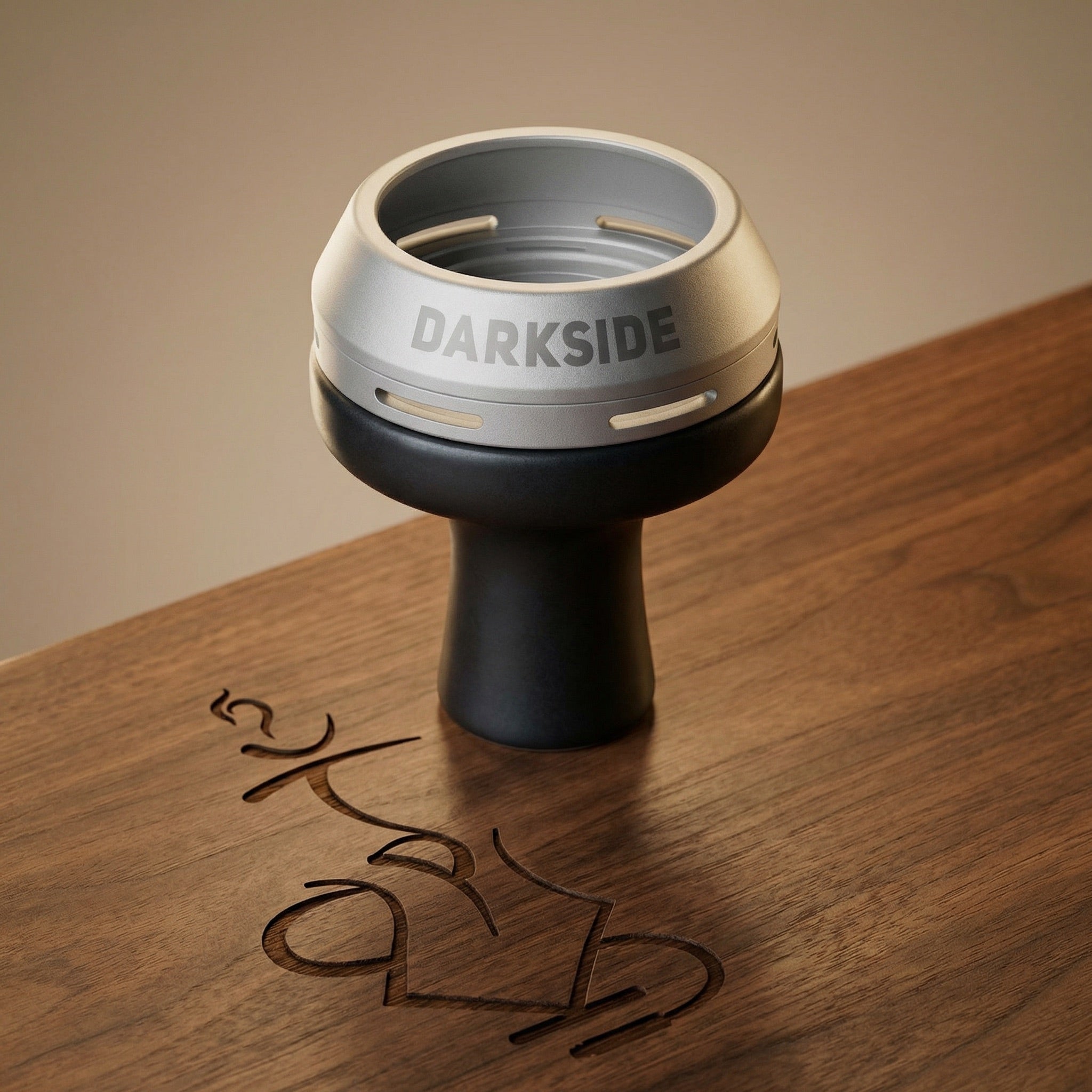 Darkside D-Heater Silver HMD seated on a flat-lipped phunnel bowl atop warm walnut, demonstrating fit for foil-free phunnel setups.