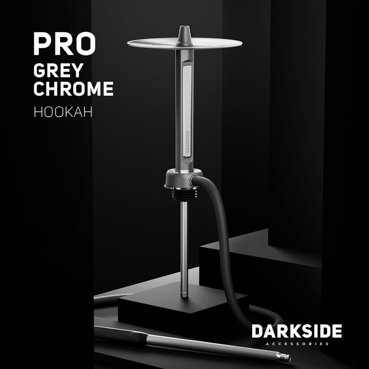 Darkside Pro shisha in grey chrome staged on a dark set with hose and stem