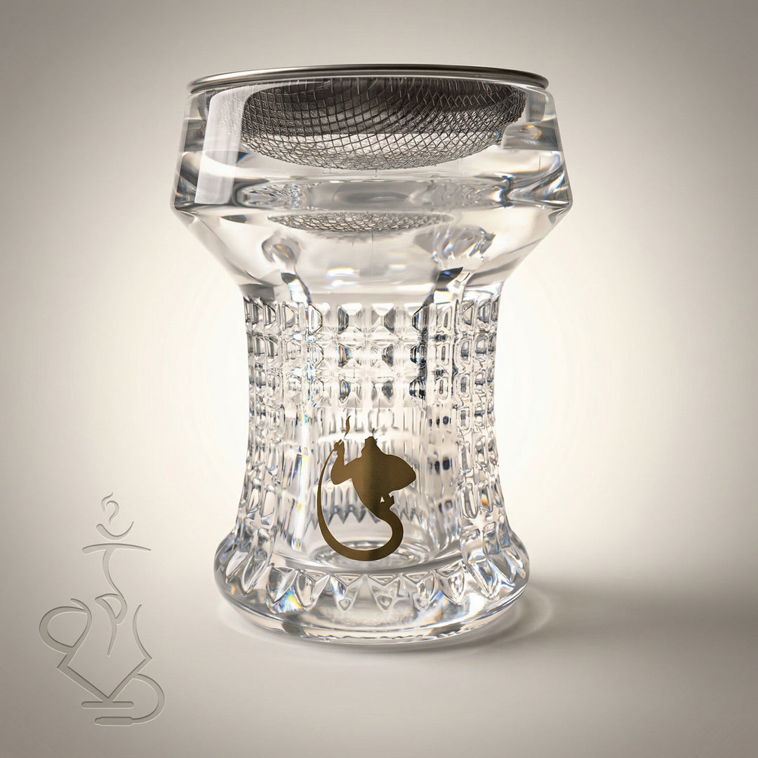Dschinni Nero crystal glass shisha head with cut-crystal waffle texture, gold Dschinni emblem, and Seflex stainless mesh insert visible through the clear glass bowl.