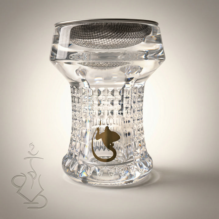 Dschinni Nero crystal glass shisha head with cut-crystal waffle texture, gold Dschinni emblem, and Seflex stainless mesh insert visible through the clear glass bowl.