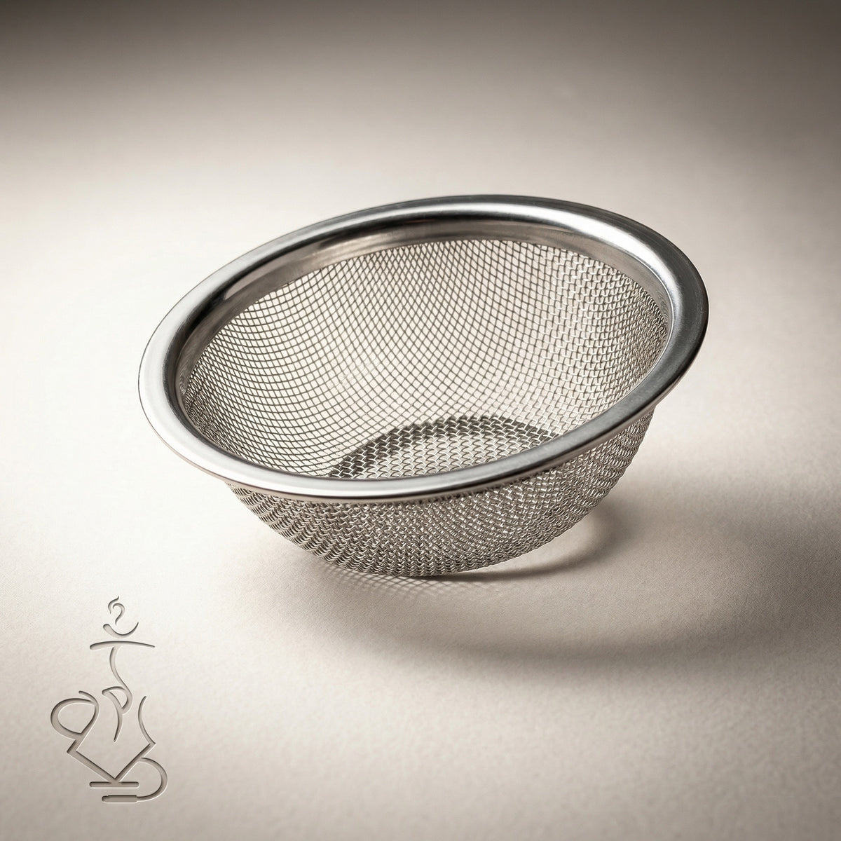 Dschinni Seflex stainless steel mesh insert with smooth rolled rim and fine woven concave mesh for consistent airflow in the Nero glass head., image 3 of 9
