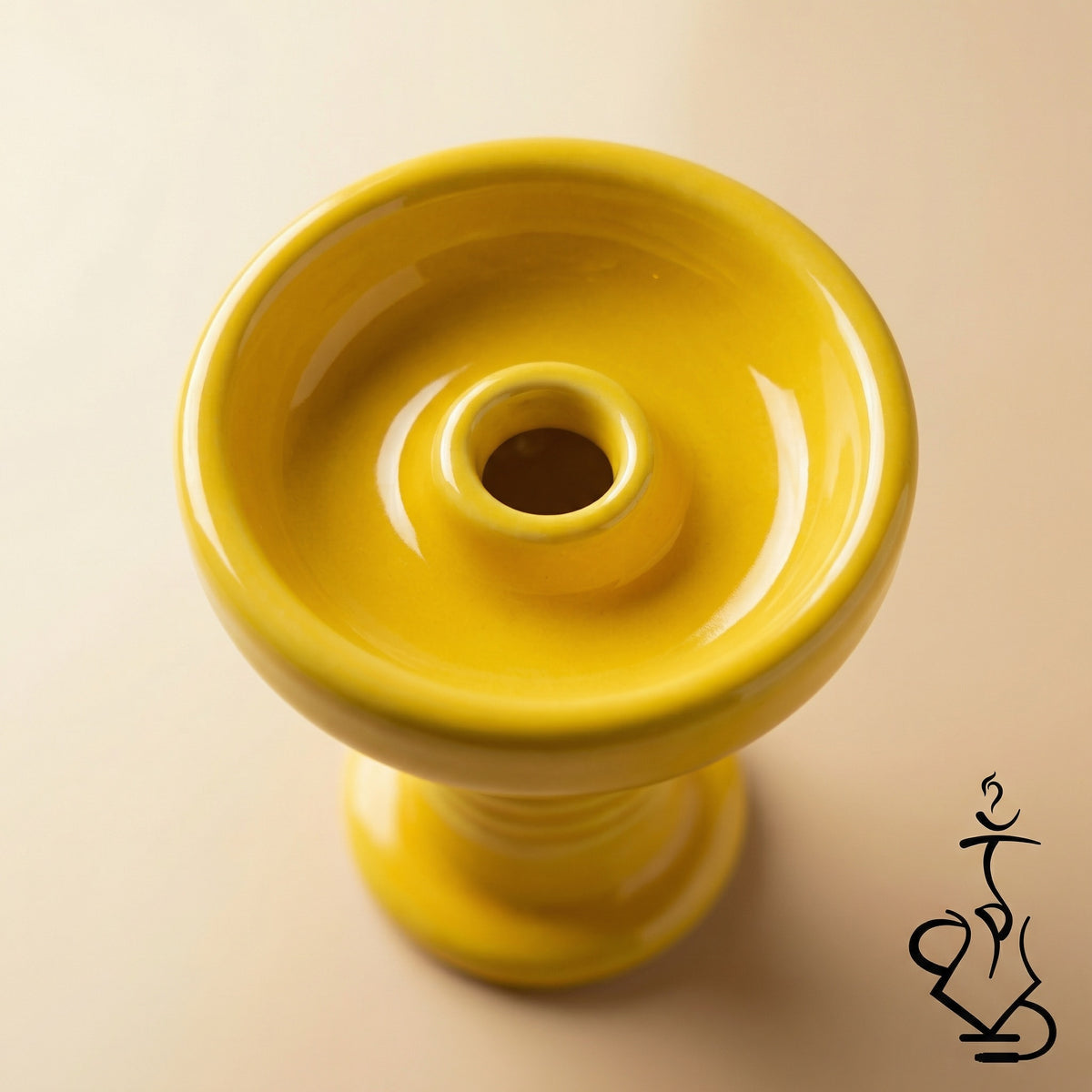 Top-down macro view of the Essentials Glazed Phunnel Bowl showing the glossy yellow glaze, concave basin, and central spire hole in sharp detail.
, image 2 of 5