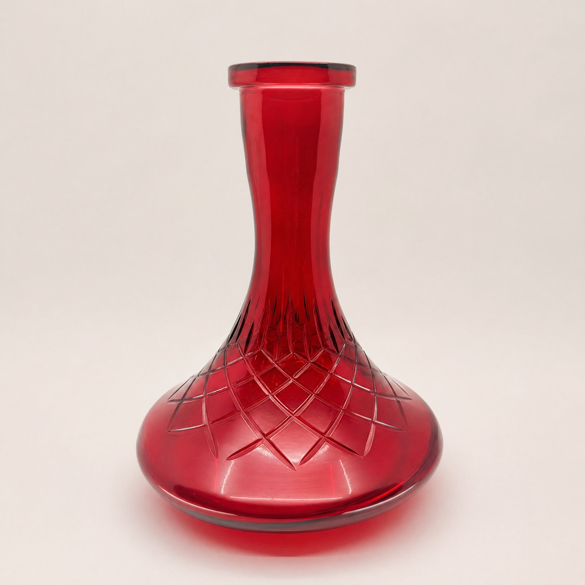 Essentials Ruby Star-Cut Russian shisha vase in saturated ruby tinted glass with cut star belly pattern and leaf-band collar