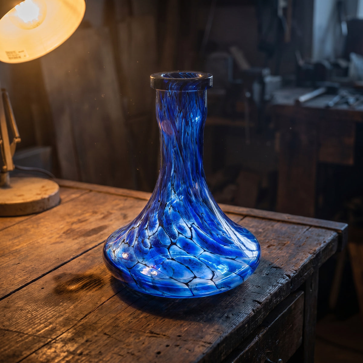 Sapphire Web shisha vase by Essentials, hand-blown cobalt crackle glass on artisan workbench under warm lamp, image 2 of 4