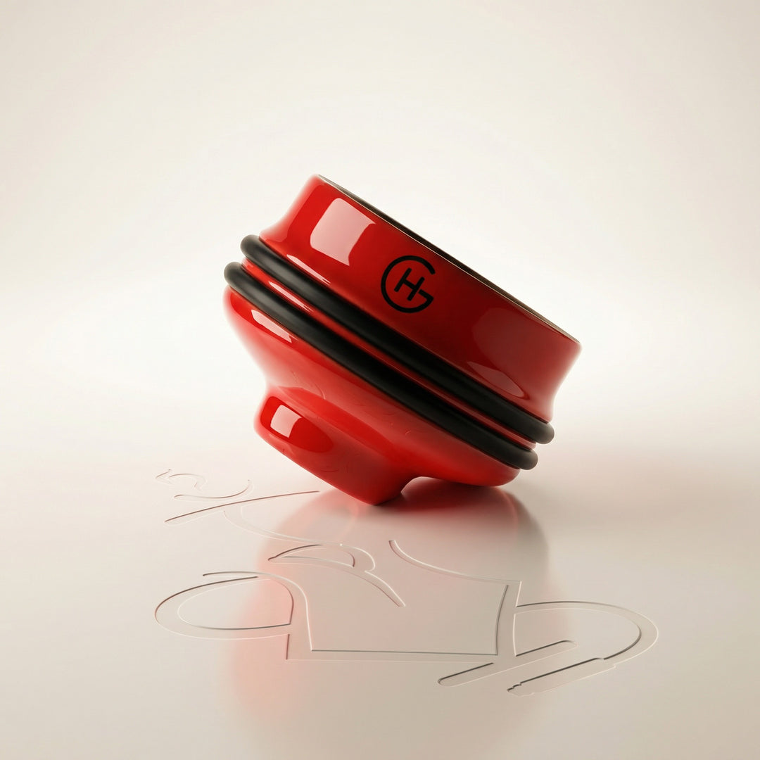 Geometry Short Phunnel Bowl in glossy red glaze with black silicone rim bands, studio front view showing compact squat ceramic hookah bowl profile.
