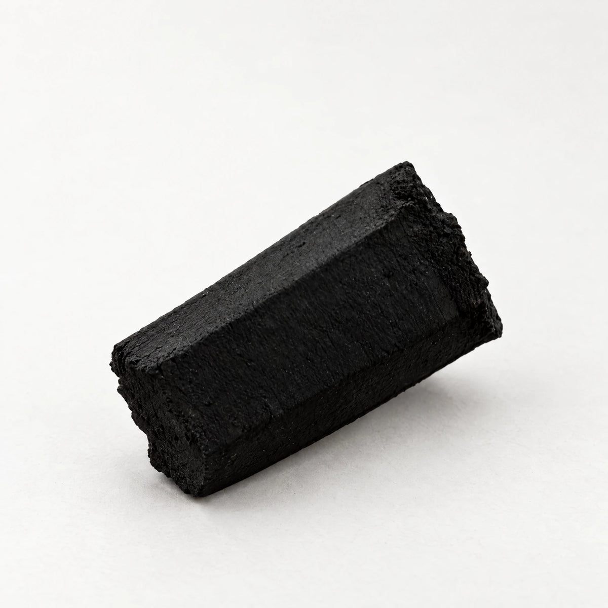 One Cerberus Coco Gen 2 hexagonal coconut shisha charcoal stick, 23 x 48 mm, on white, image 3 of 3
