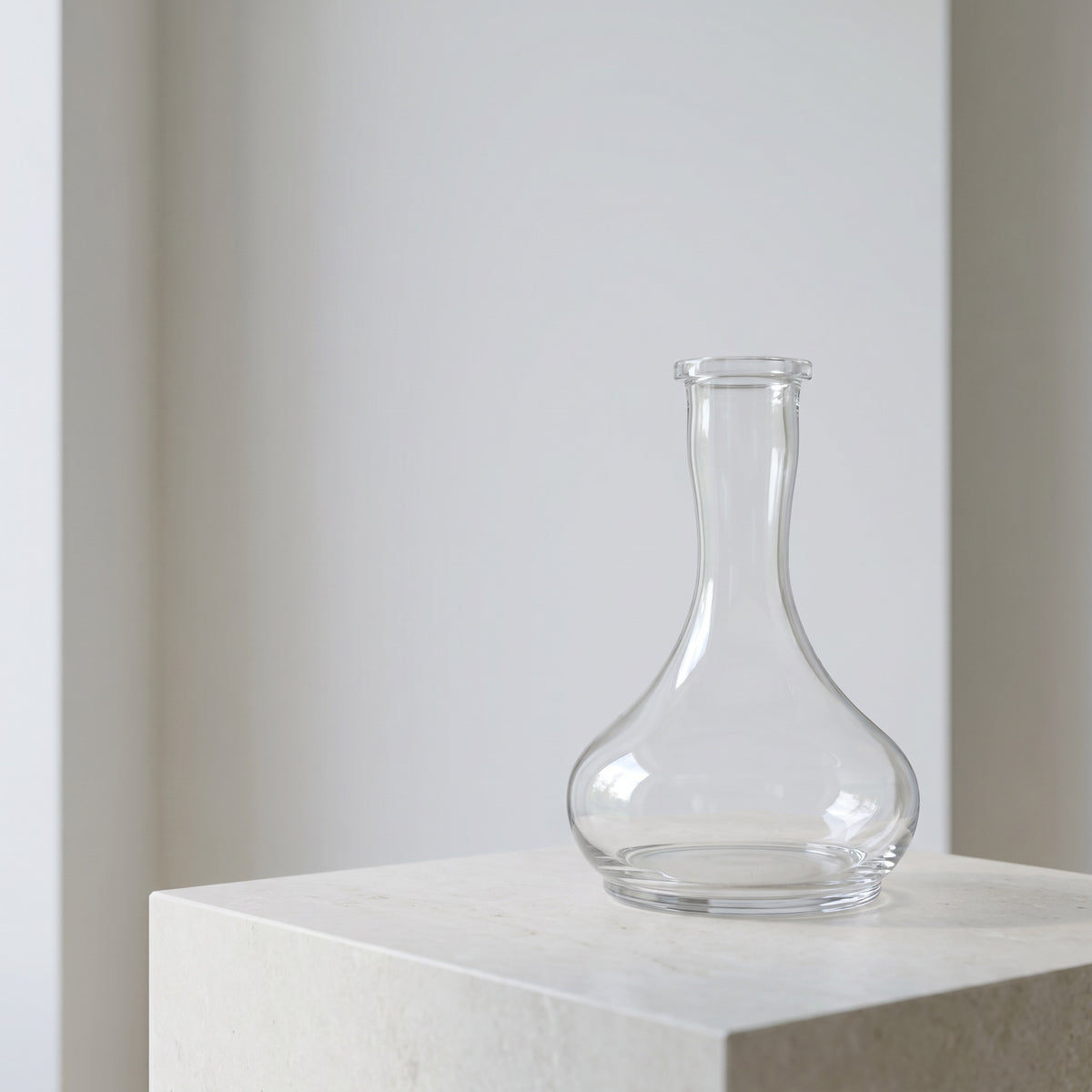 Hookah Tree Tear Drop clear glass shisha vase on pale limestone plinth in soft architectural daylight, image 3 of 4
