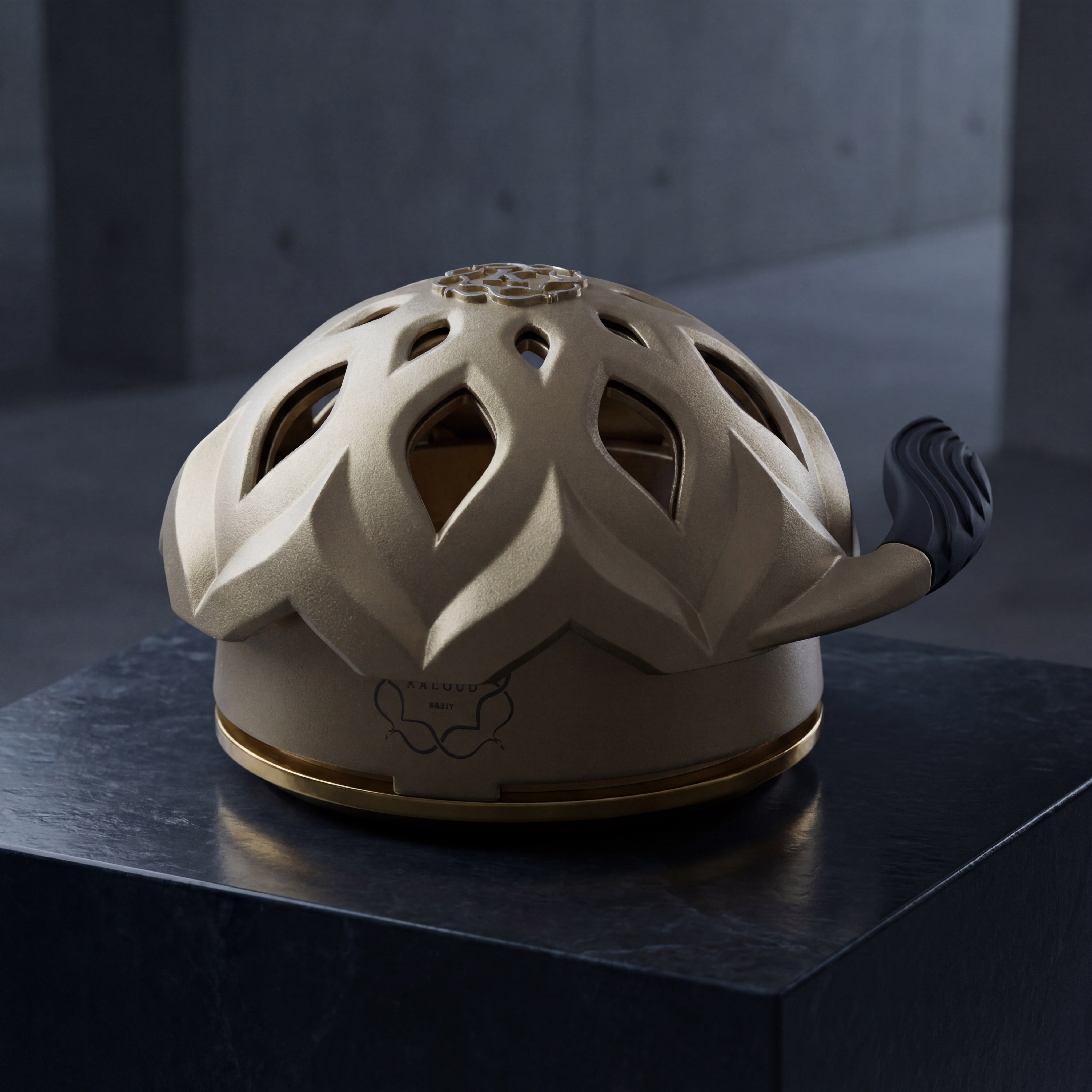 Kaloud Lotus I+3 Auris Gold HMD on dark slate plinth, architectural dusk hero shot