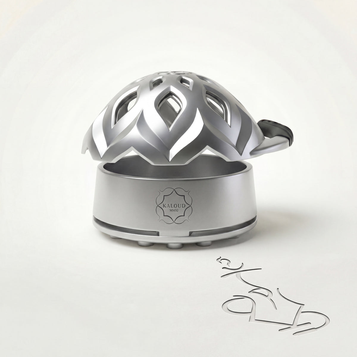 Kaloud Lotus I+3 Argis Silver heat management device, brushed stainless steel base and ornate lotus-petal aluminium lid with central Kaloud K crest, photographed in studio., image 6 of 19