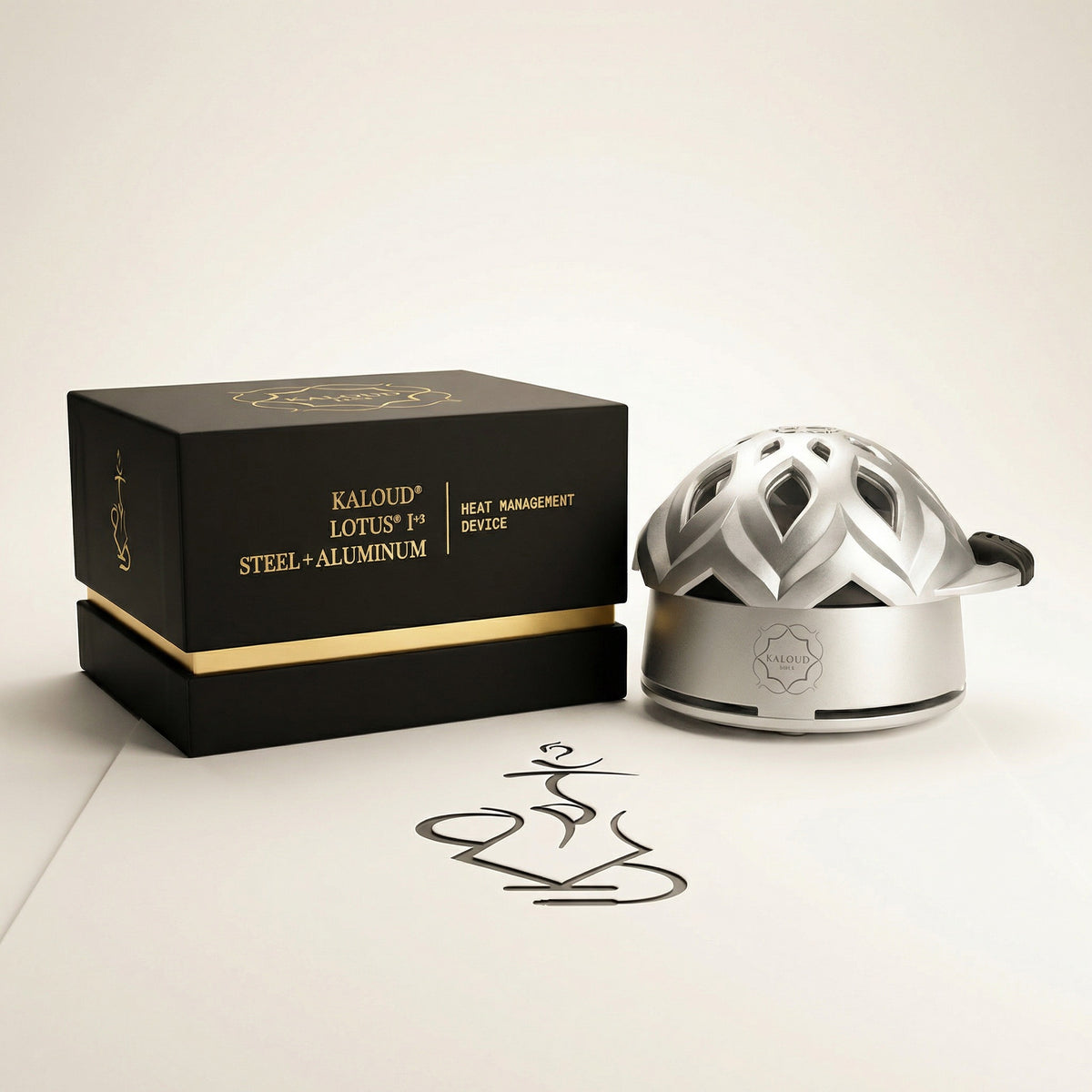 Kaloud Lotus I+3 Argis Silver heat management device displayed beside its premium matte black retail box with gold foil Kaloud branding., image 13 of 19