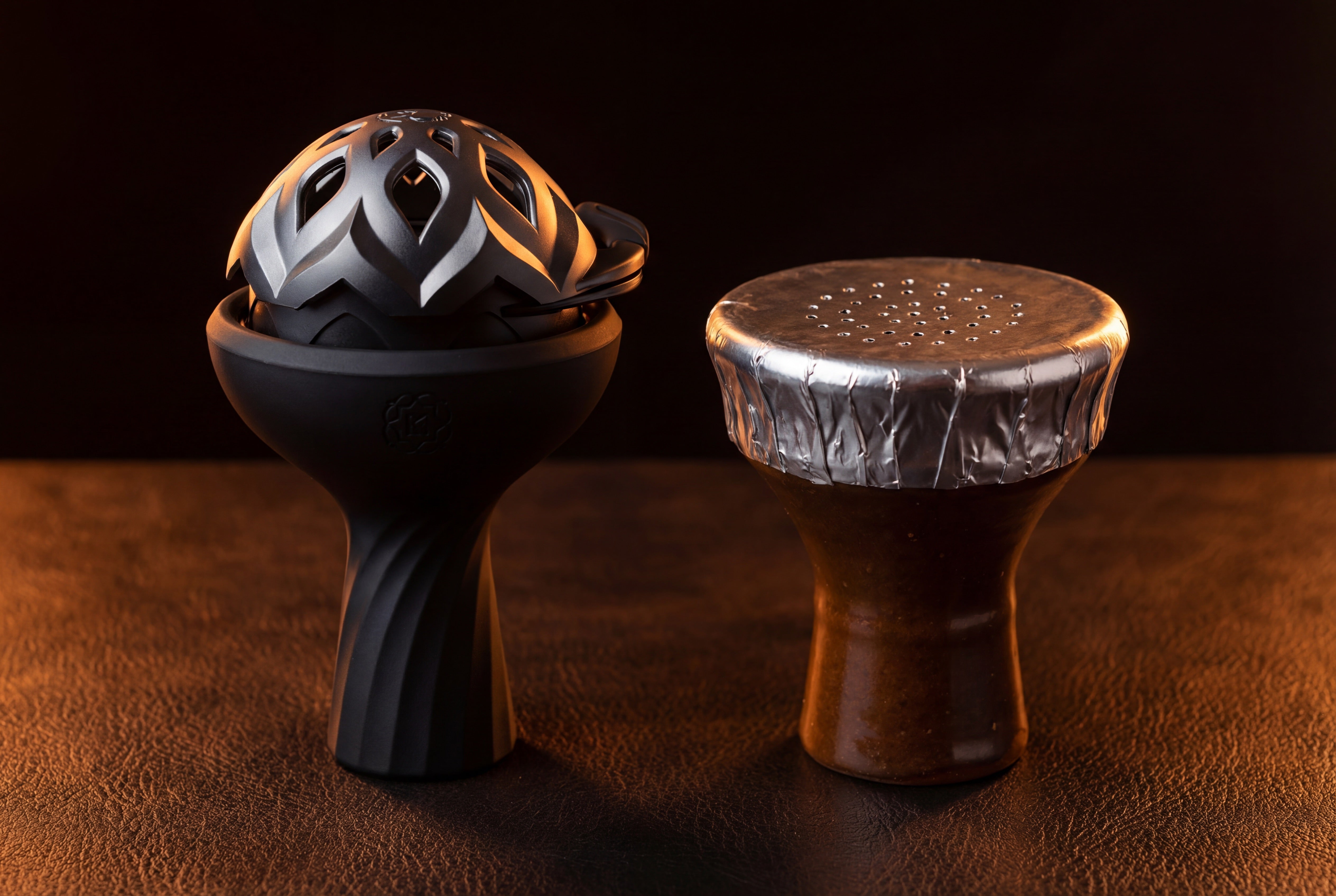 Kaloud Samsaris bowl with HMD and Oblako ceramic bowl with foil, shisha bowl collection on dark leather surface