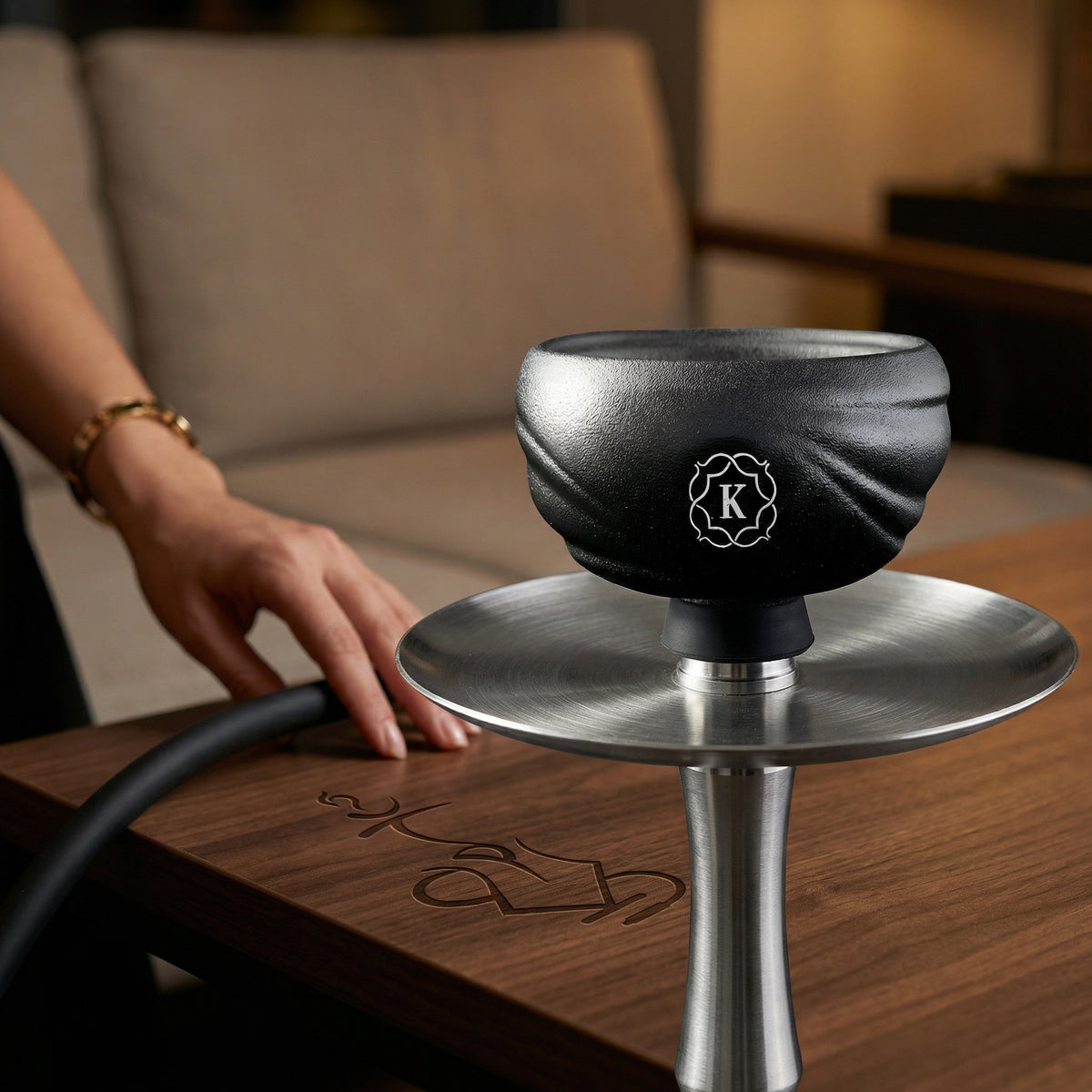 Kaloud Samsaris Kore All Ceramic shisha bowl mounted on a hookah stem above a stainless steel charcoal tray during a warm evening session, image 4 of 11