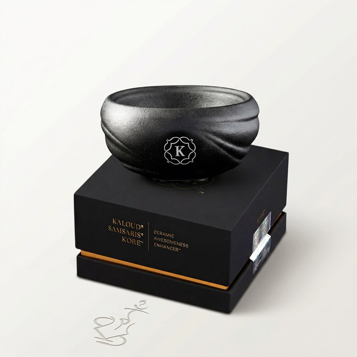 Kaloud Samsaris Kore All Ceramic shisha bowl resting on premium black-and-gold Kaloud presentation box on a warm white studio background, image 6 of 11