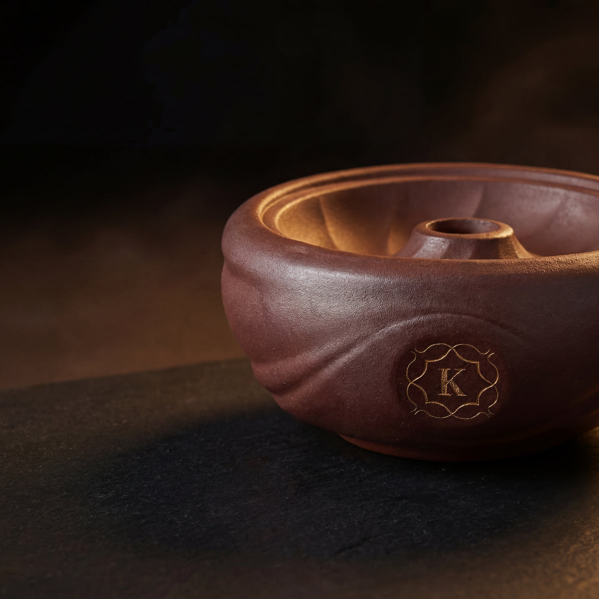 Kaloud Kore Qì Short red clay phunnel bowl on dark basalt with warm raking light, gold cartouche detail, image 2 of 17