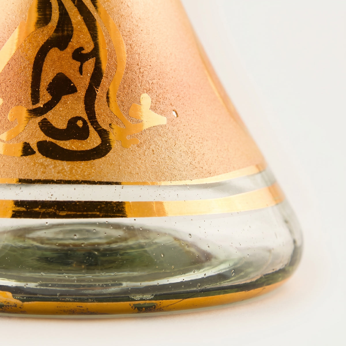 Macro detail of Khalil Mamoon Amber Gold base showing hand-painted silk-screen texture and seed bubbles., image 4 of 8