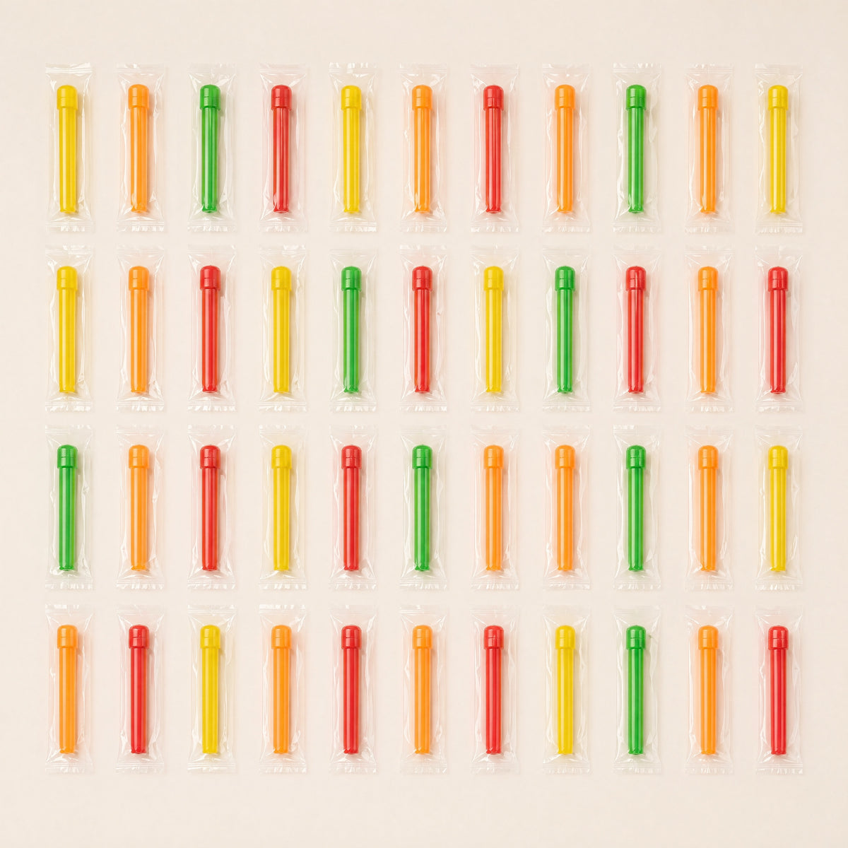Forty-four individually wrapped Khalil Mamoon disposable shisha tips laid out in a grid showing the multi-colour pack contents, image 3 of 10