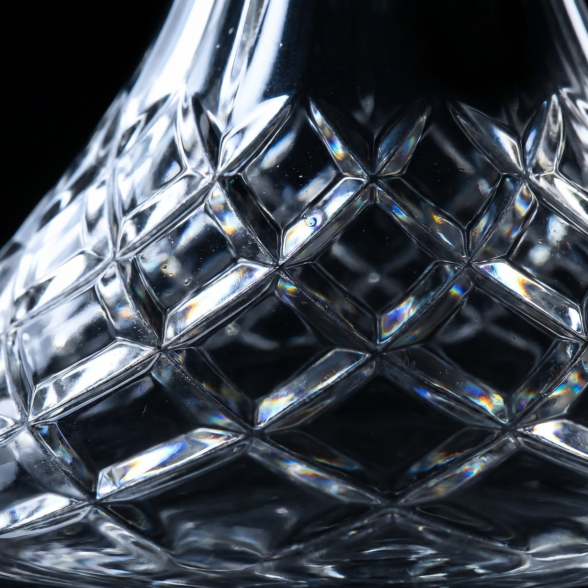 Macro detail of Lismore diamond-cut lattice with prismatic facet highlights on cut-crystal hookah base, image 4 of 6