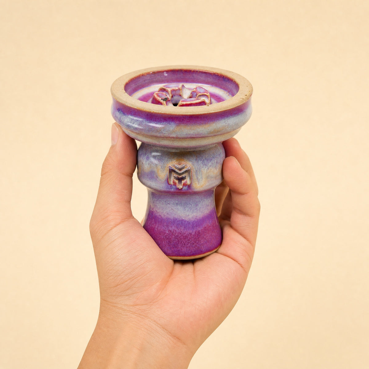 MIT Luxury Ashera Coral bowl held in hand, showing scale and rose-mauve drip-glaze finish, image 5 of 6
