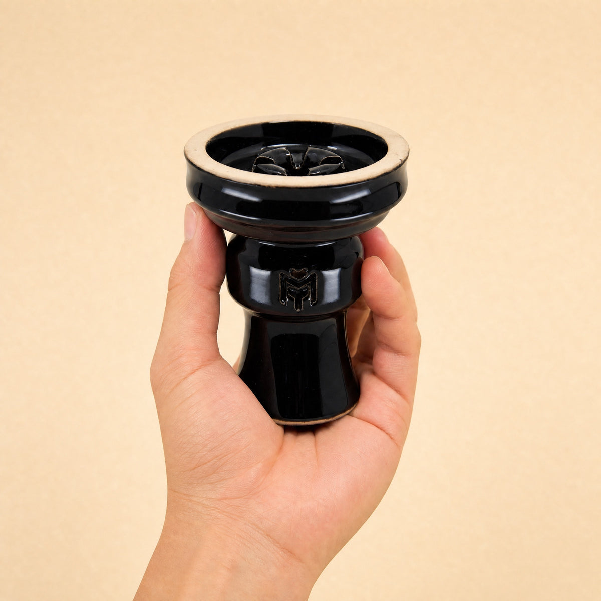 MIT Luxury Ashera Eclipse bowl held in hand, showing scale and glossy obsidian-black glaze finish, image 5 of 6