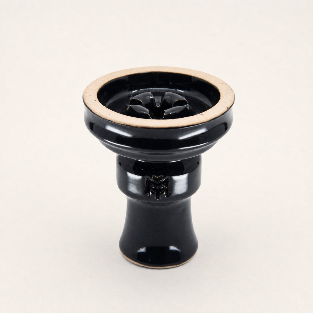 MIT Luxury Ashera Eclipse phunnel bowl, glossy obsidian-black glaze with raw stoneware rim, three-quarter studio view