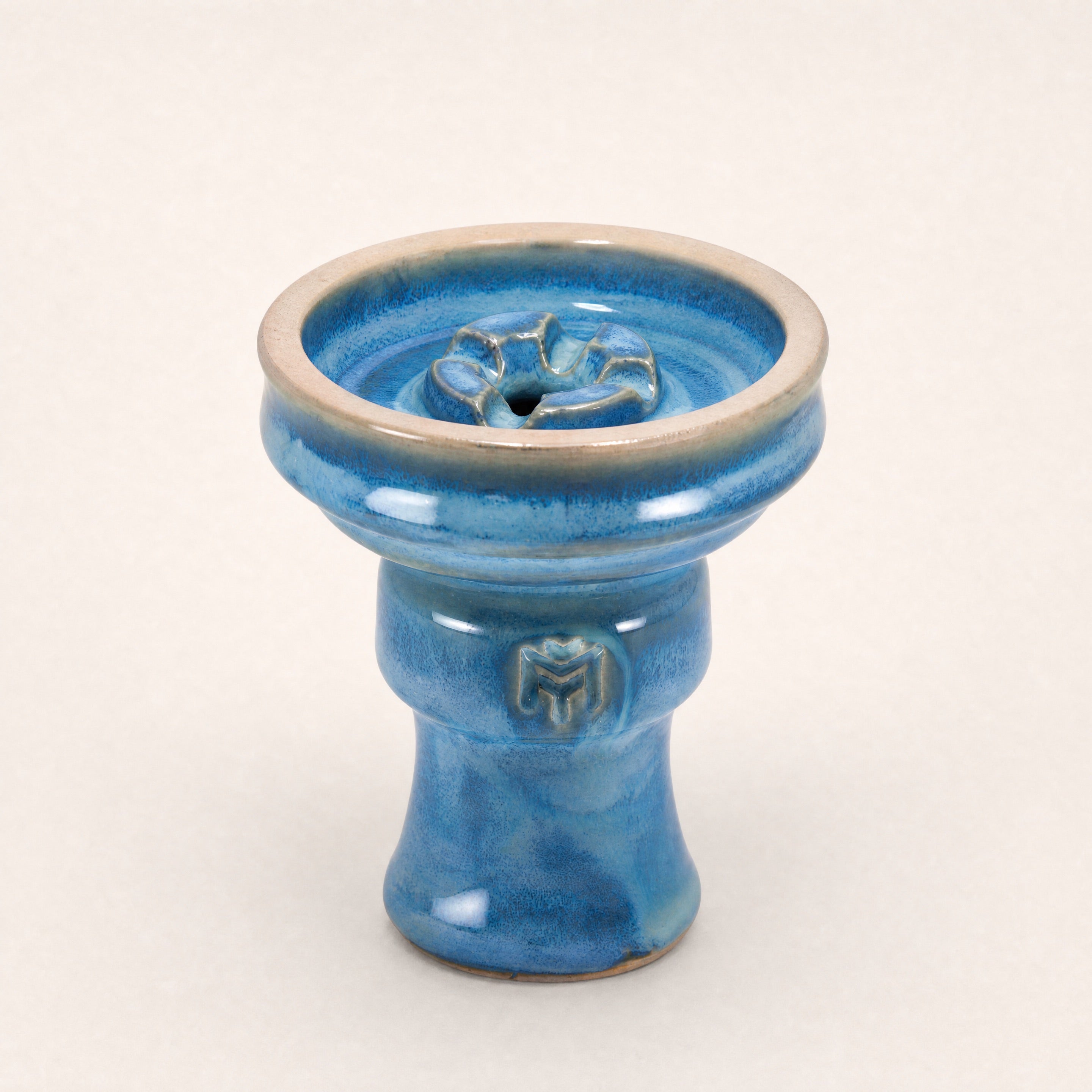 MIT Luxury Ashera Tide phunnel bowl, azure-blue mottled glaze on stoneware body, three-quarter studio view