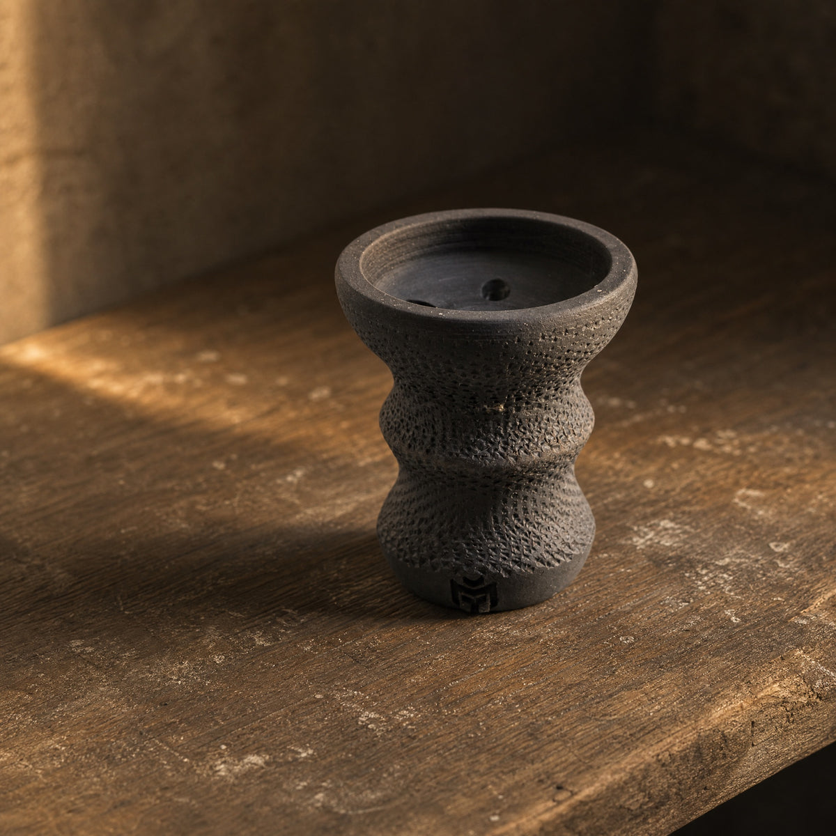 Handmade MIT Luxury DarkStar Turkish bowl on aged workshop bench in afternoon light, unglazed stoneware, image 2 of 6