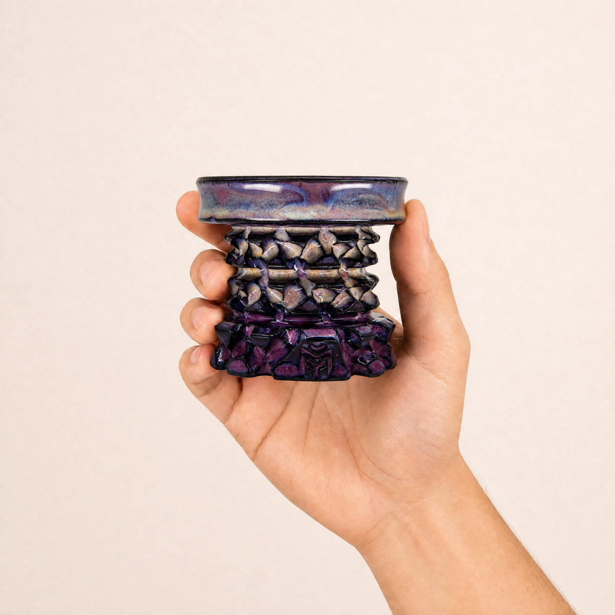 MIT Luxury Mitovation V2 Amethyst bowl held in hand, showing 80mm scale and amethyst glaze with lavender plate, image 5 of 6