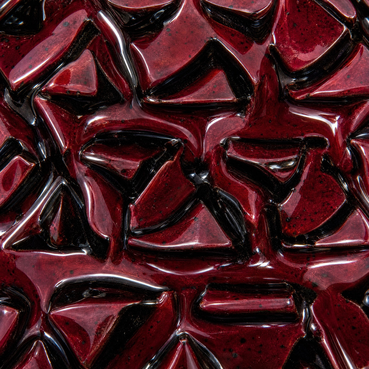 MIT Luxury Mitovation V2 Ruby bowl macro detail of oxblood red glaze with black pooling across sculptural spikes, image 6 of 6