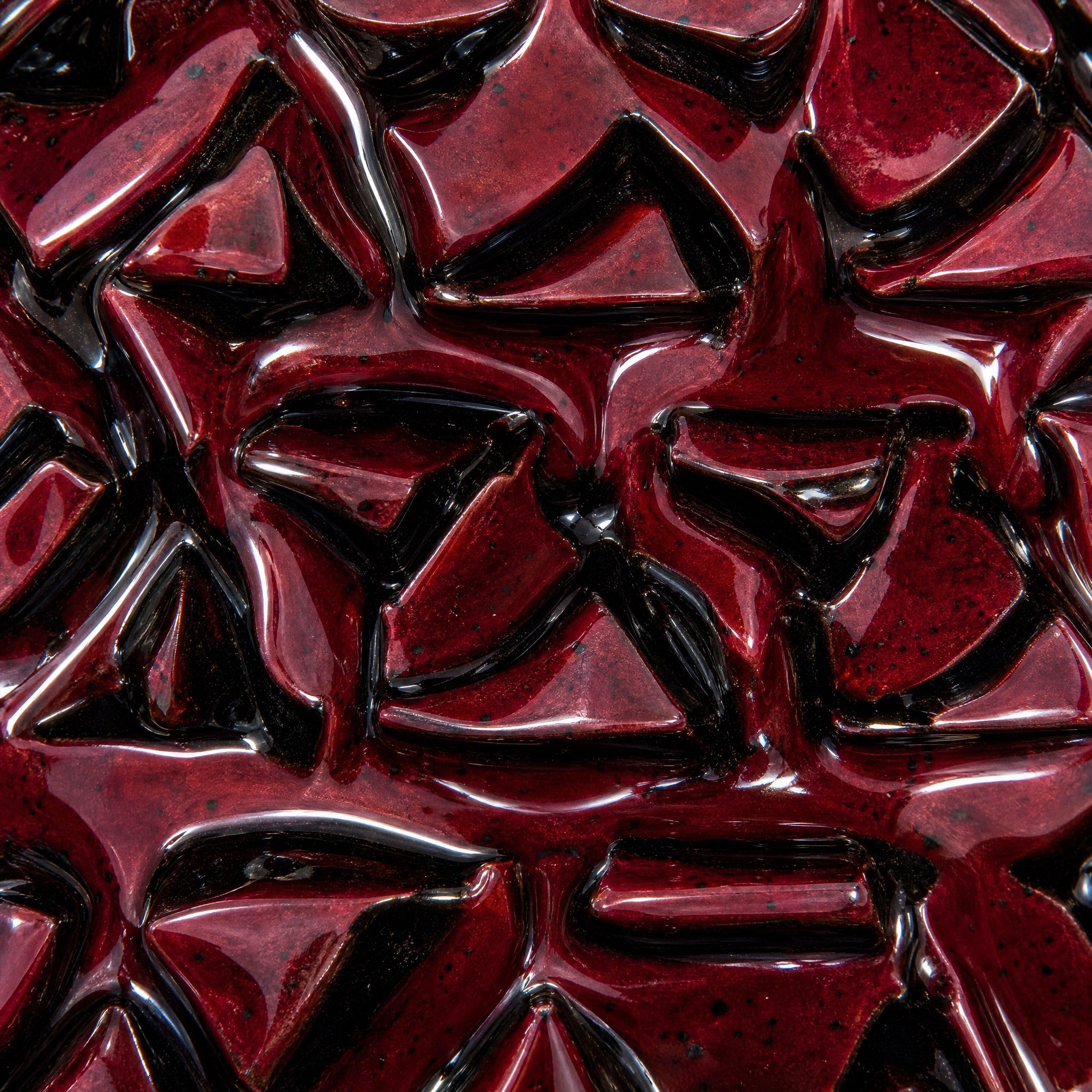 MIT Luxury Mitovation V2 Ruby bowl macro detail of oxblood red glaze with black pooling across sculptural spikes
