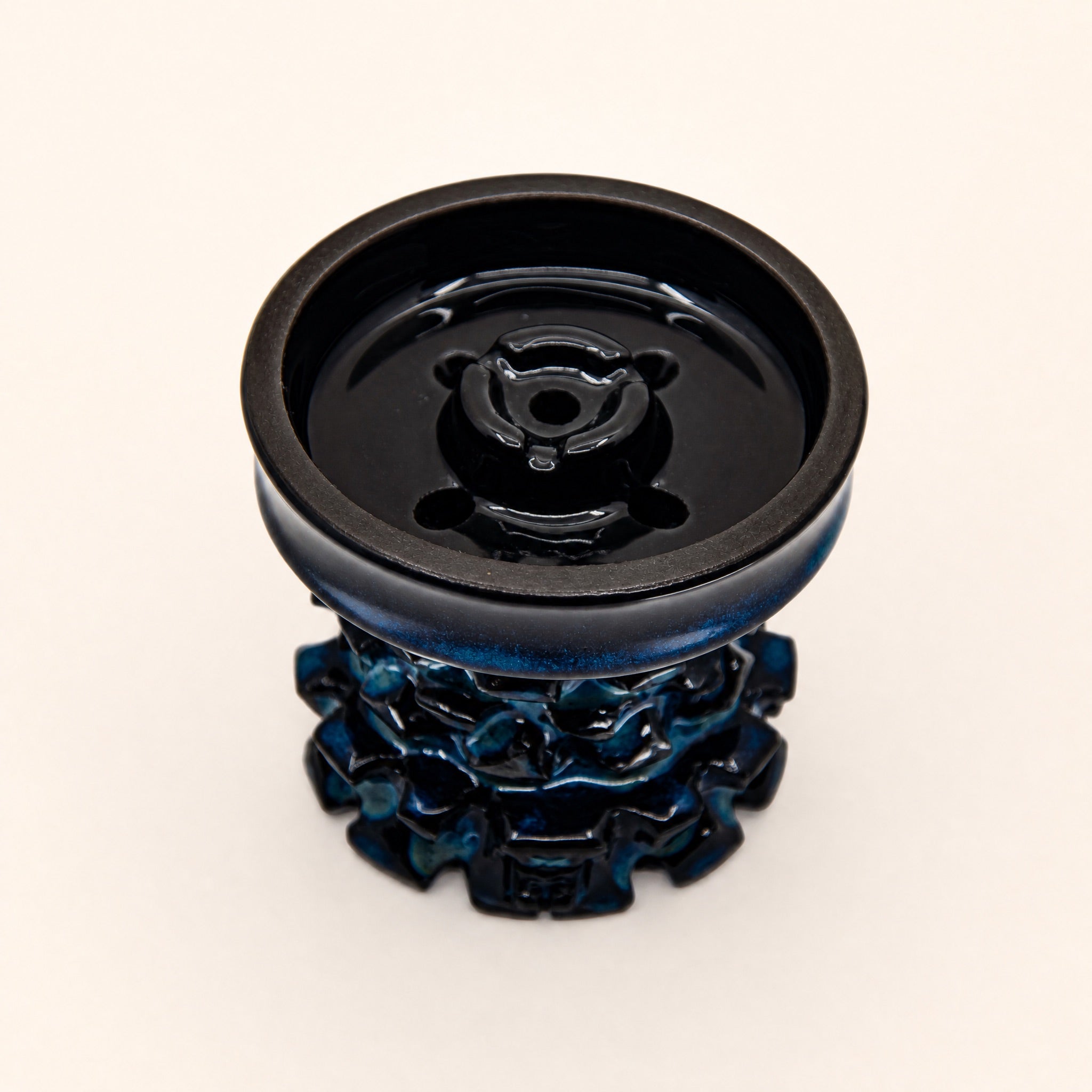 MIT Luxury Mitovation V2 Sapphire bowl top-down showing five-hole hybrid chamber and four-petal spire crown