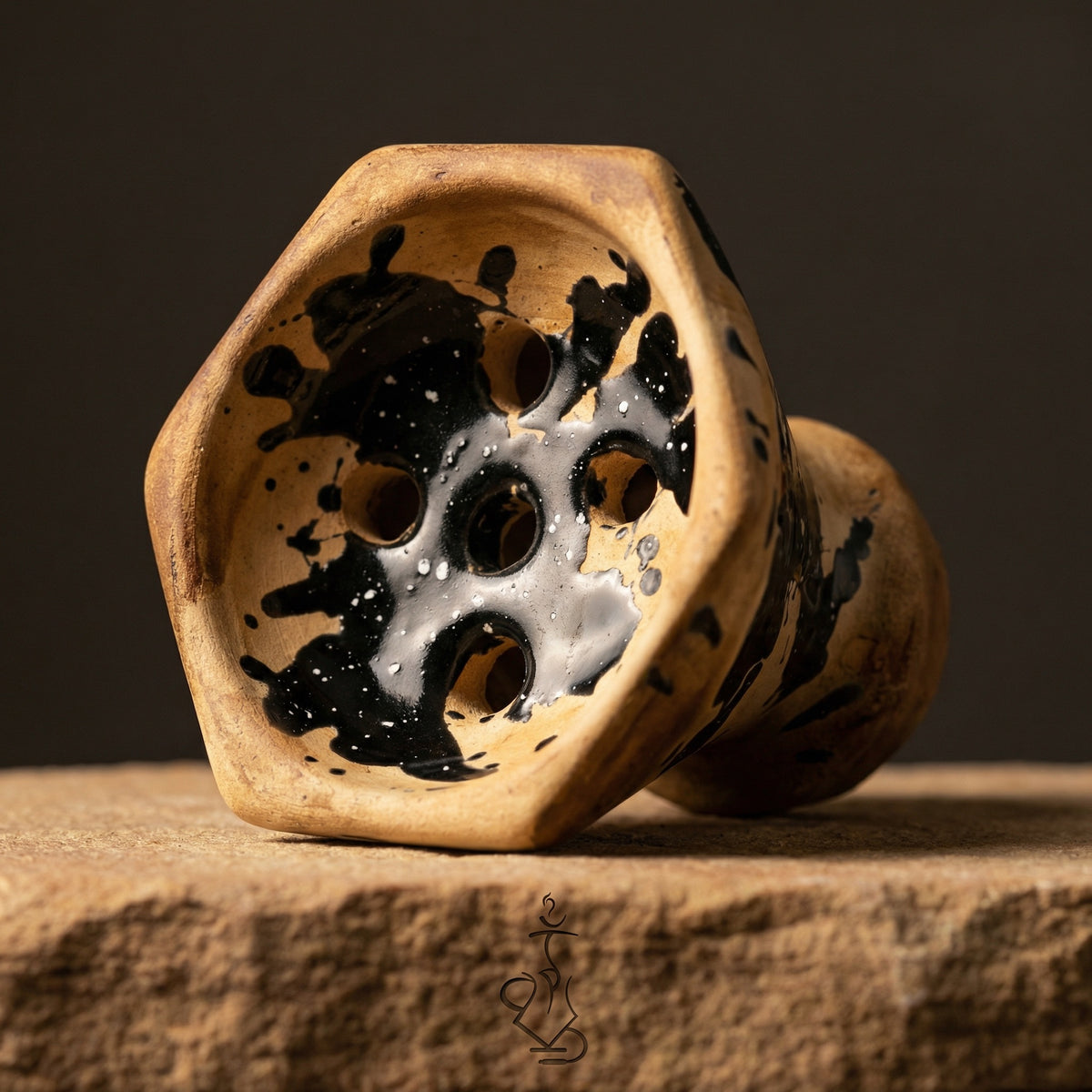 Moon Grand Cap bowl interior showing traditional Egyptian hole pattern and black splatter glaze on handmade clay, macro detail view, image 2 of 15