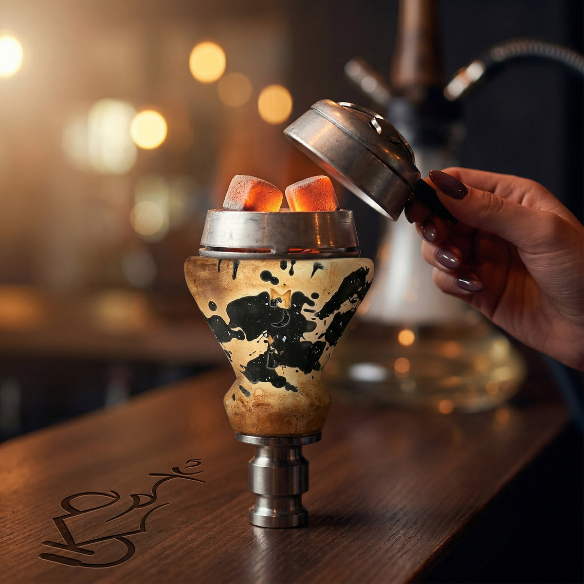 Moon Grand Cap clay bowl in use on a hookah with heat management device, hand adjusting HMD lid during a warm evening session, image 3 of 15