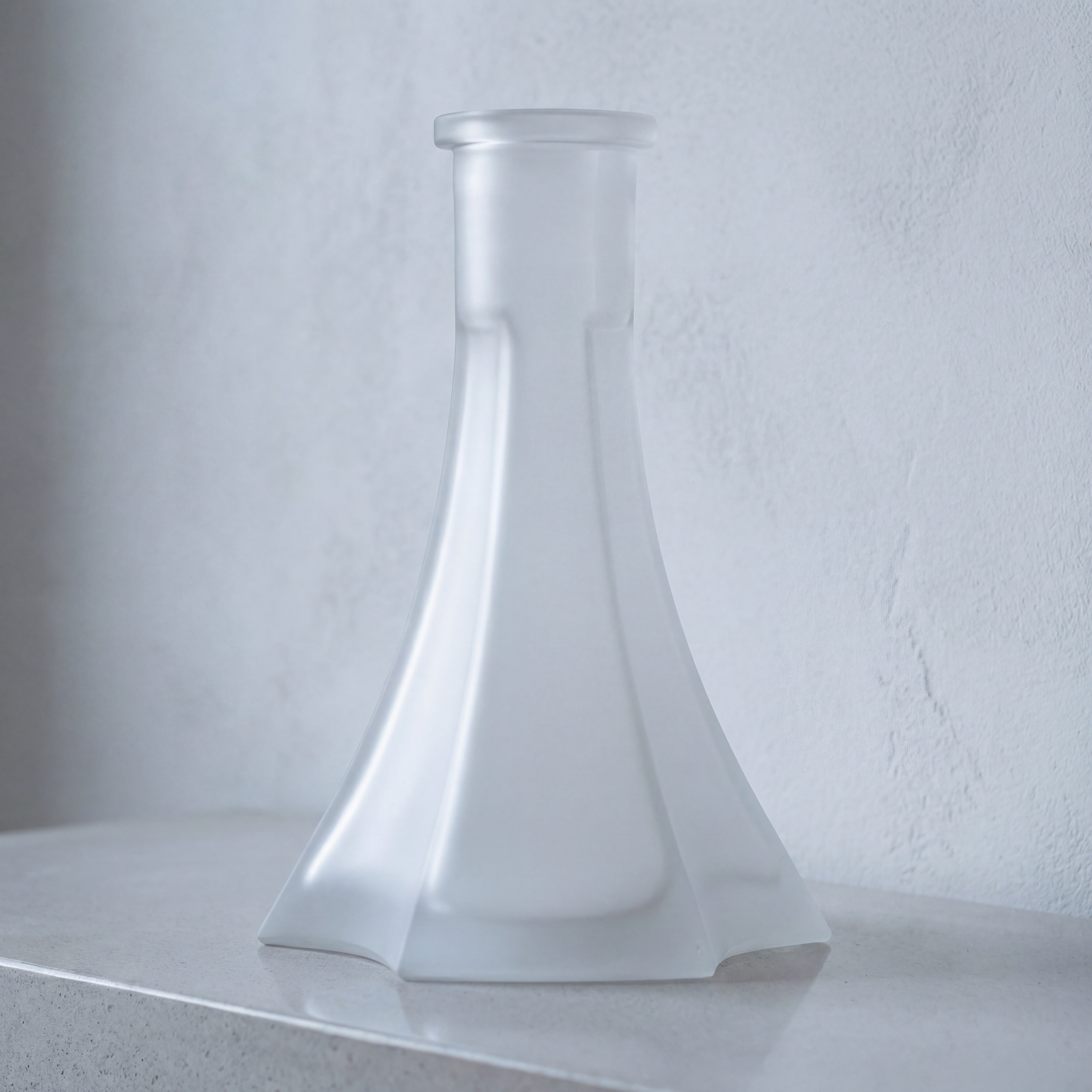 OVO x Neolux Frosty White frosted glass hookah base on pale concrete console in modern interior, The Premium Way
