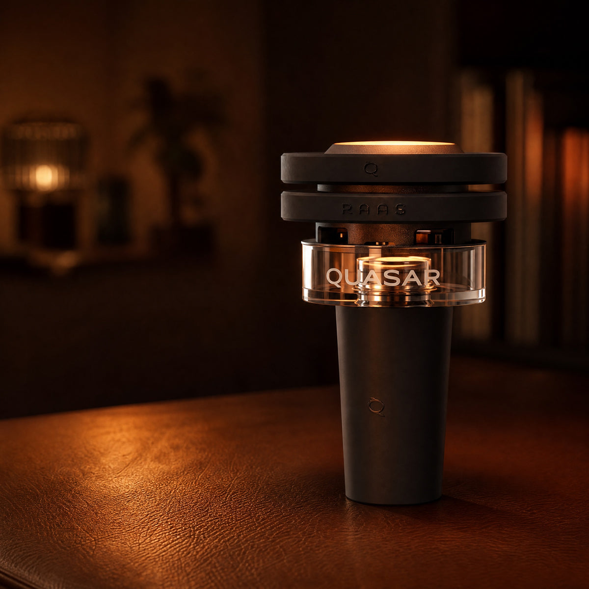 Quasar Petit Raas 2 compact thermal bowl mid-session with a warm single-coal glow on leather, image 3 of 13