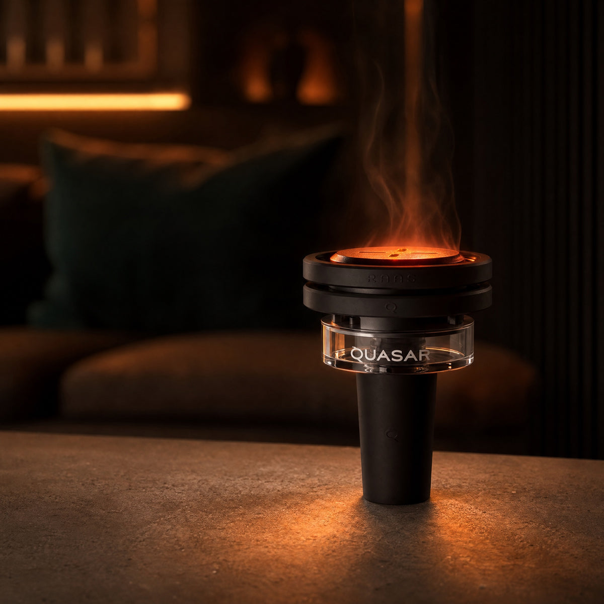 Quasar Raas 2 thermal bowl mid-session with glowing coals on a warm lounge table, image 4 of 17