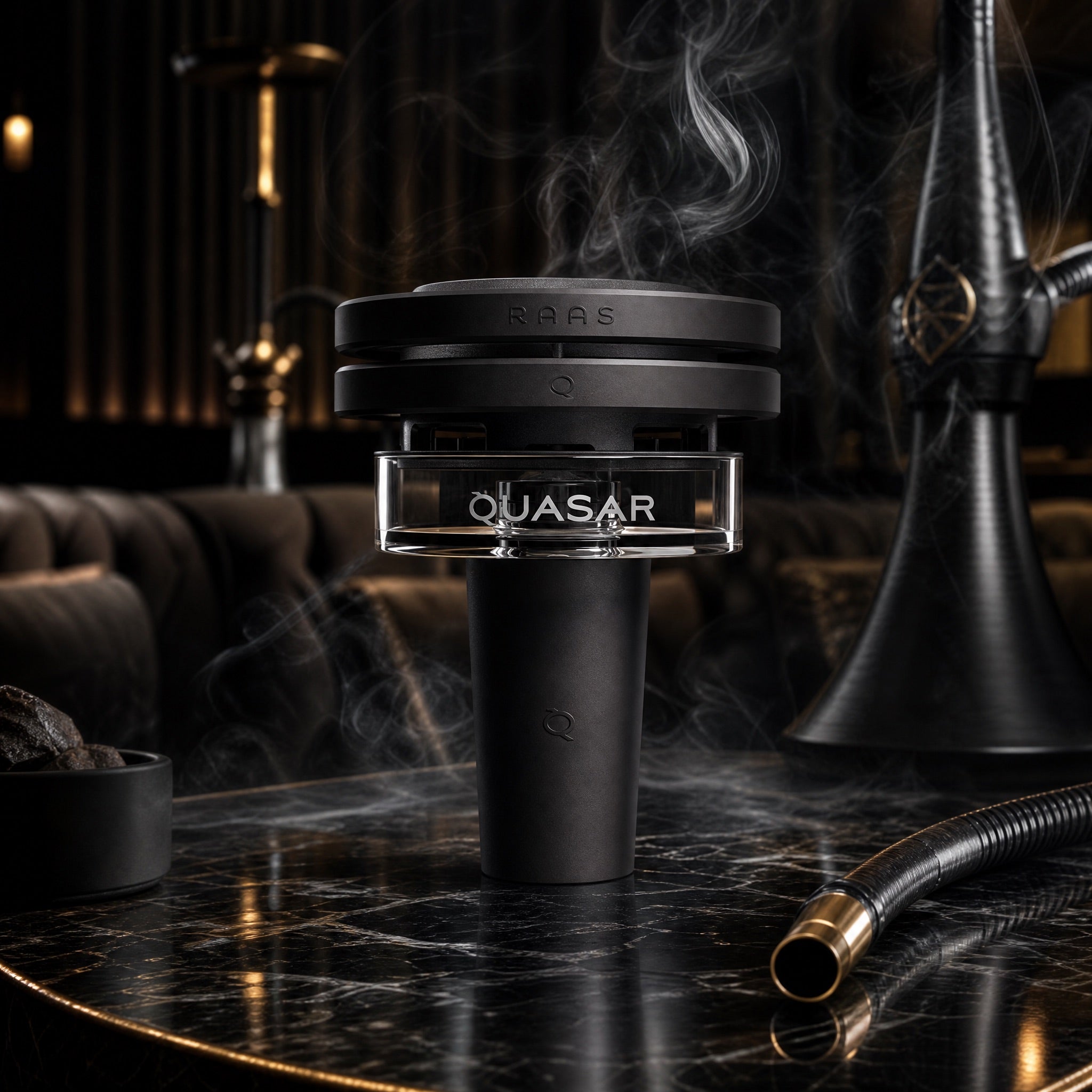 Quasar Raas 2 thermal shisha bowl on black marble in a luxe hookah lounge with gold accents