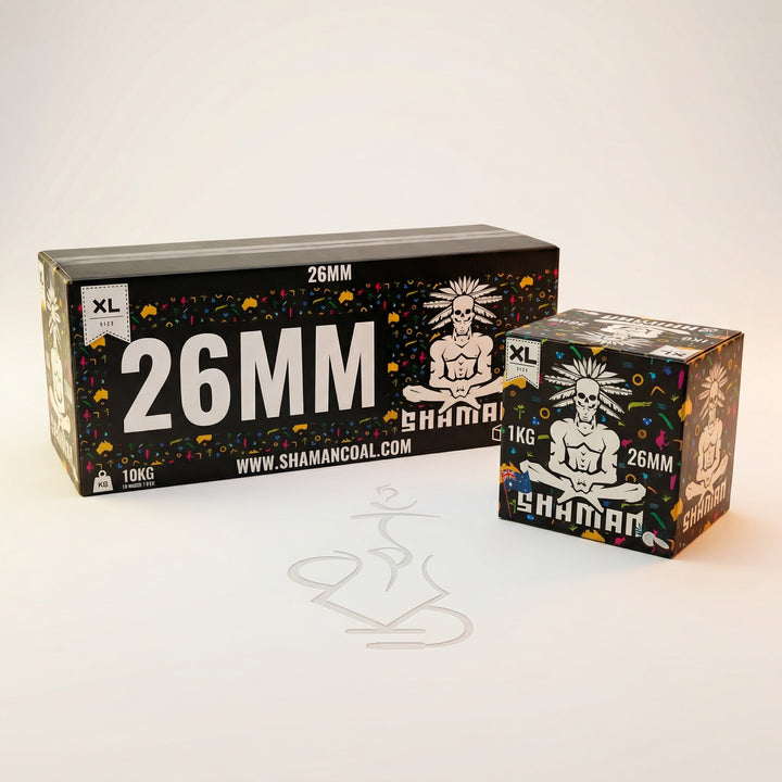 Shaman 26mm coconut charcoal 10kg master box and 1kg box displayed side by side showing the scale difference in a professional studio setting.