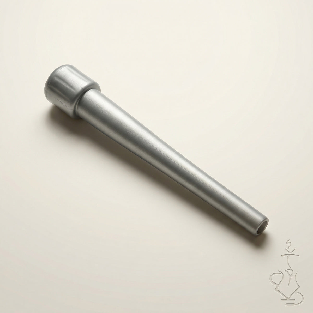 ShishaDoc disposable hookah mouth tip in long matte metallic silver on warm white studio background, image 16 of 18