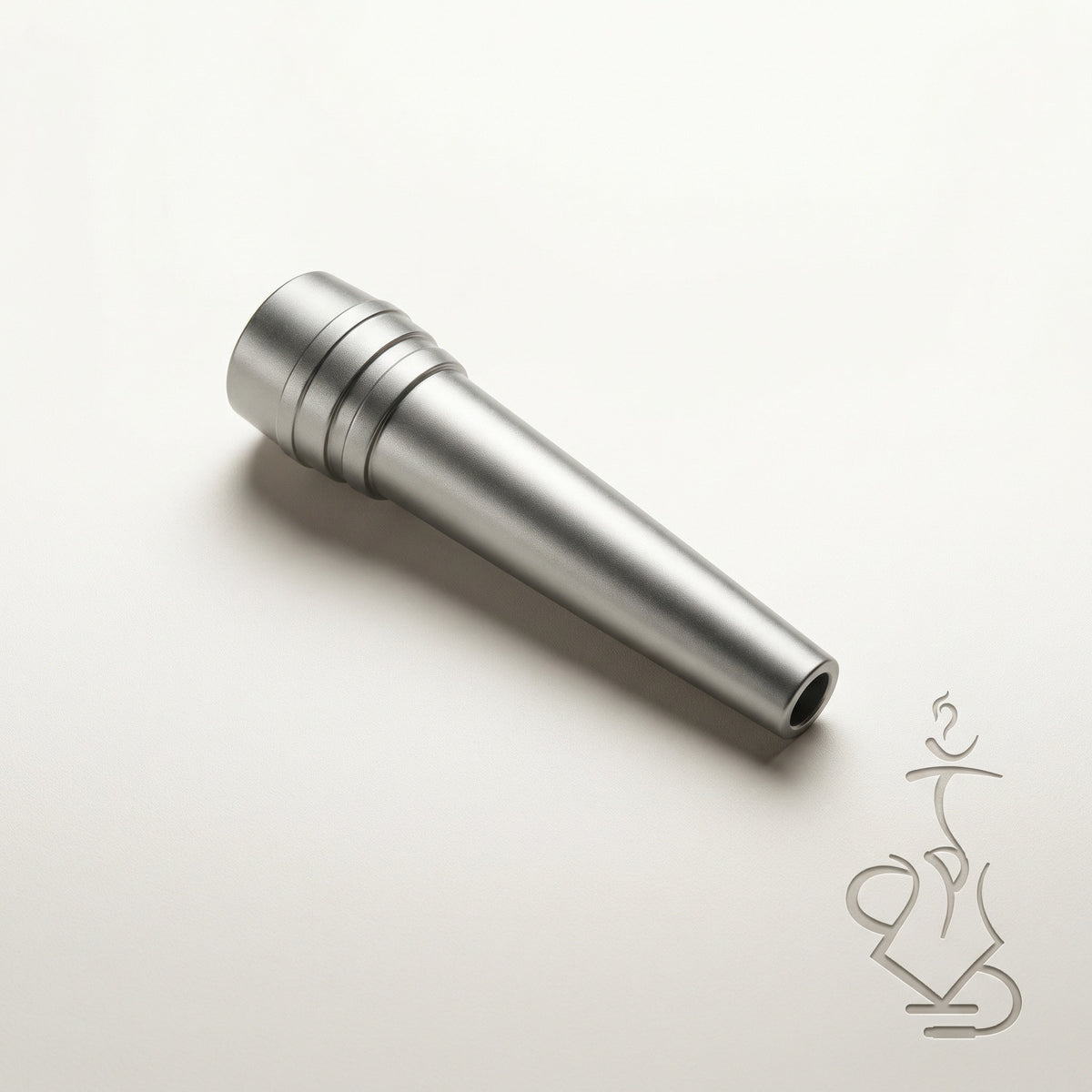 ShishaDoc disposable hookah mouth tip in short matte metallic silver on warm white studio background, image 10 of 18